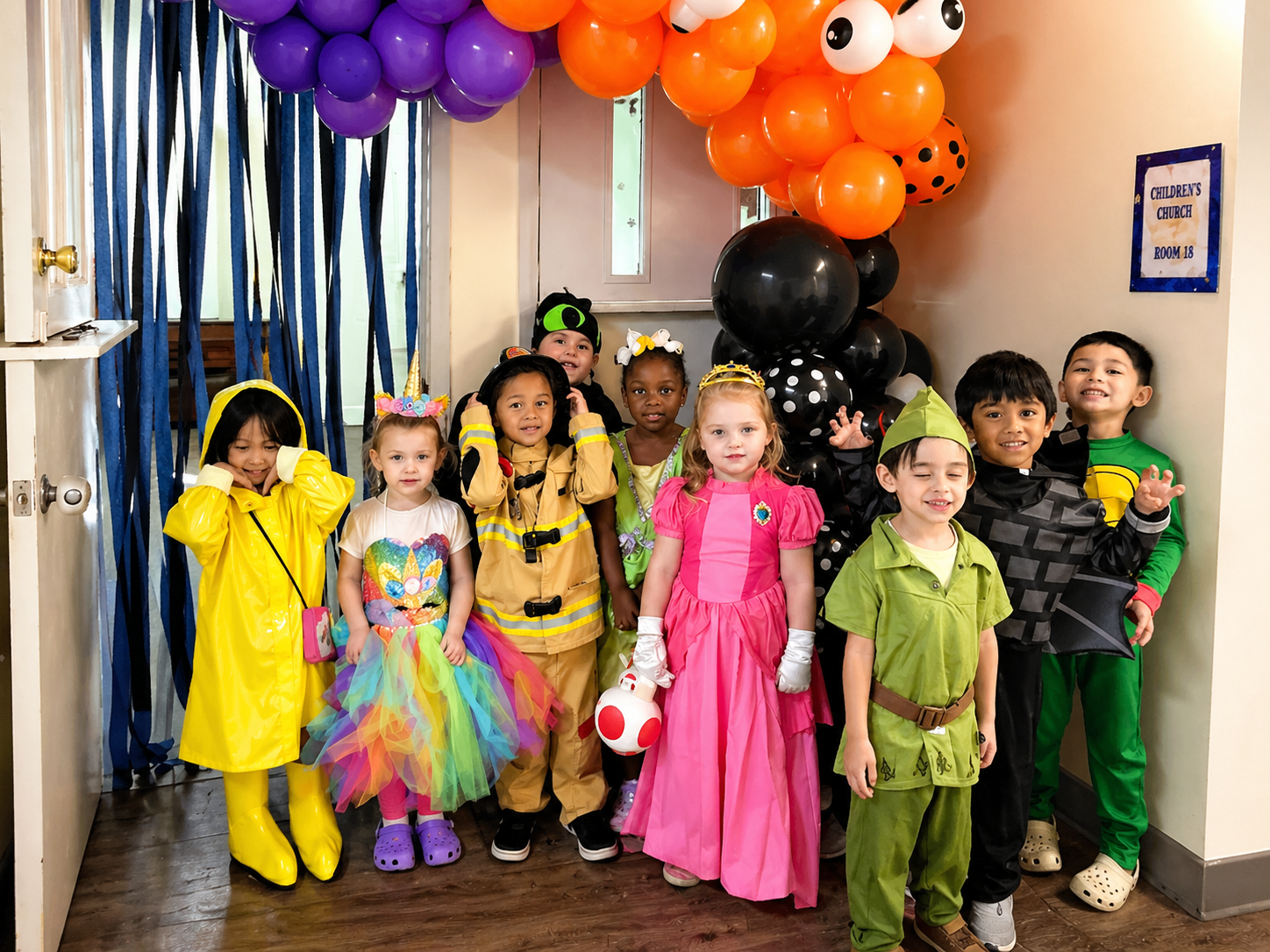 Children dressed up for a cheerful classroom celebration